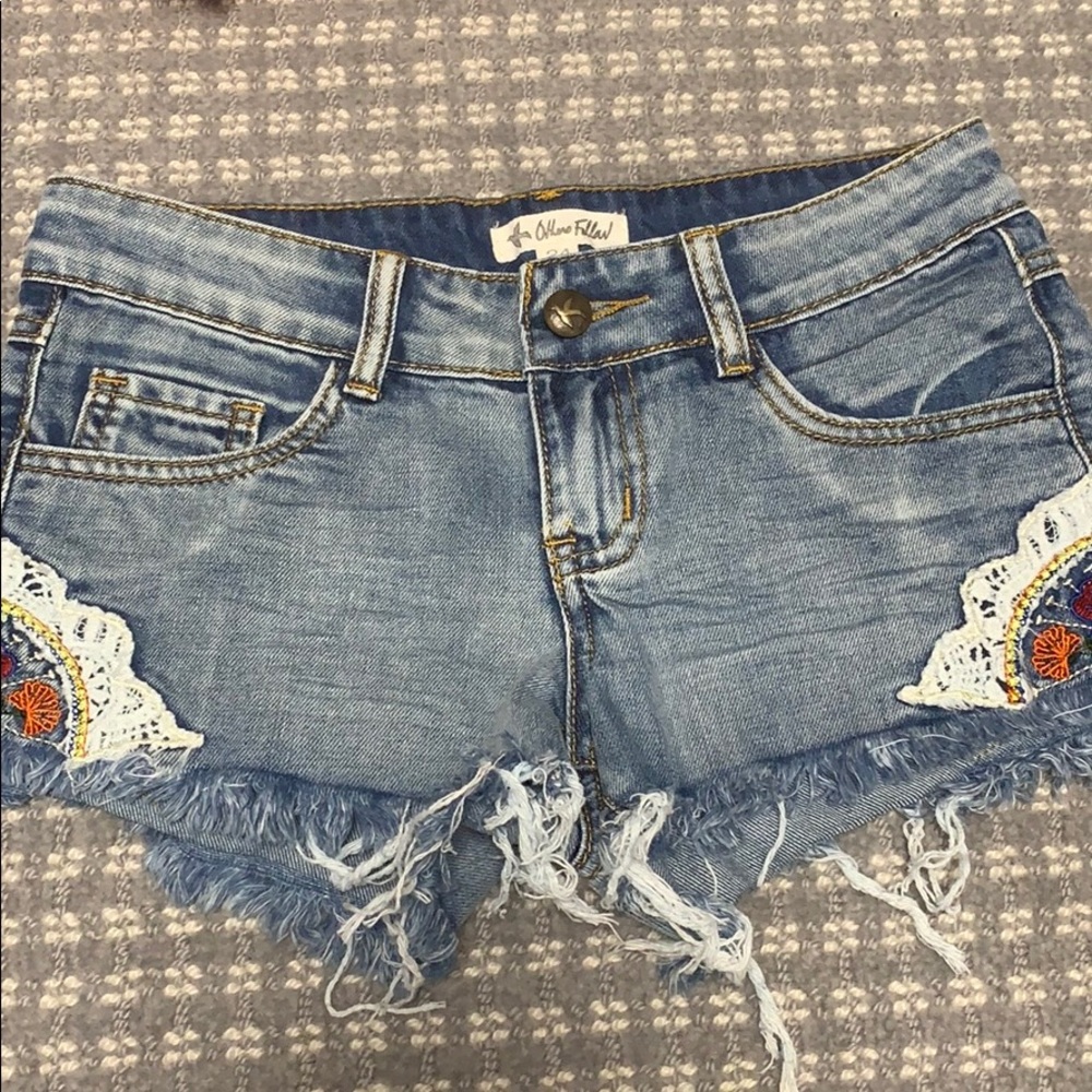 Flower embroidered jean shorts